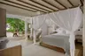 Deluxe-beach-villa-suite-with-pool-bedroom-interior.jpg