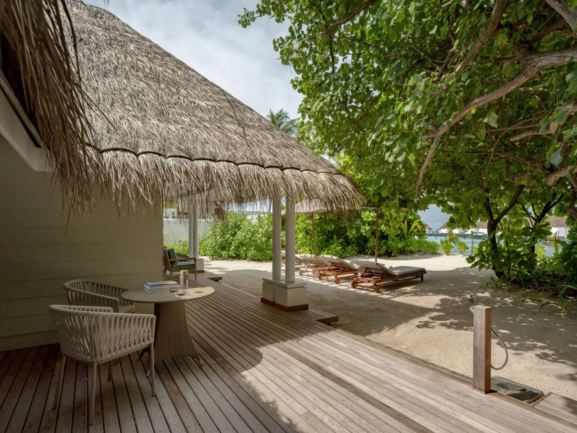 Three-bedroom-beach-villa-suite-with-pool-exterior-deck.jpg
