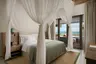 Beach-retreat-with-pool-bedroom.jpg