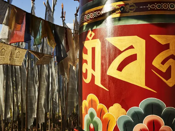 small_Six-Senses_prayer_wheel_and-_prayer_flags_08.11.23