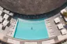 AerialKagiMaldives_PublicPoolAerialwithModelSwimming