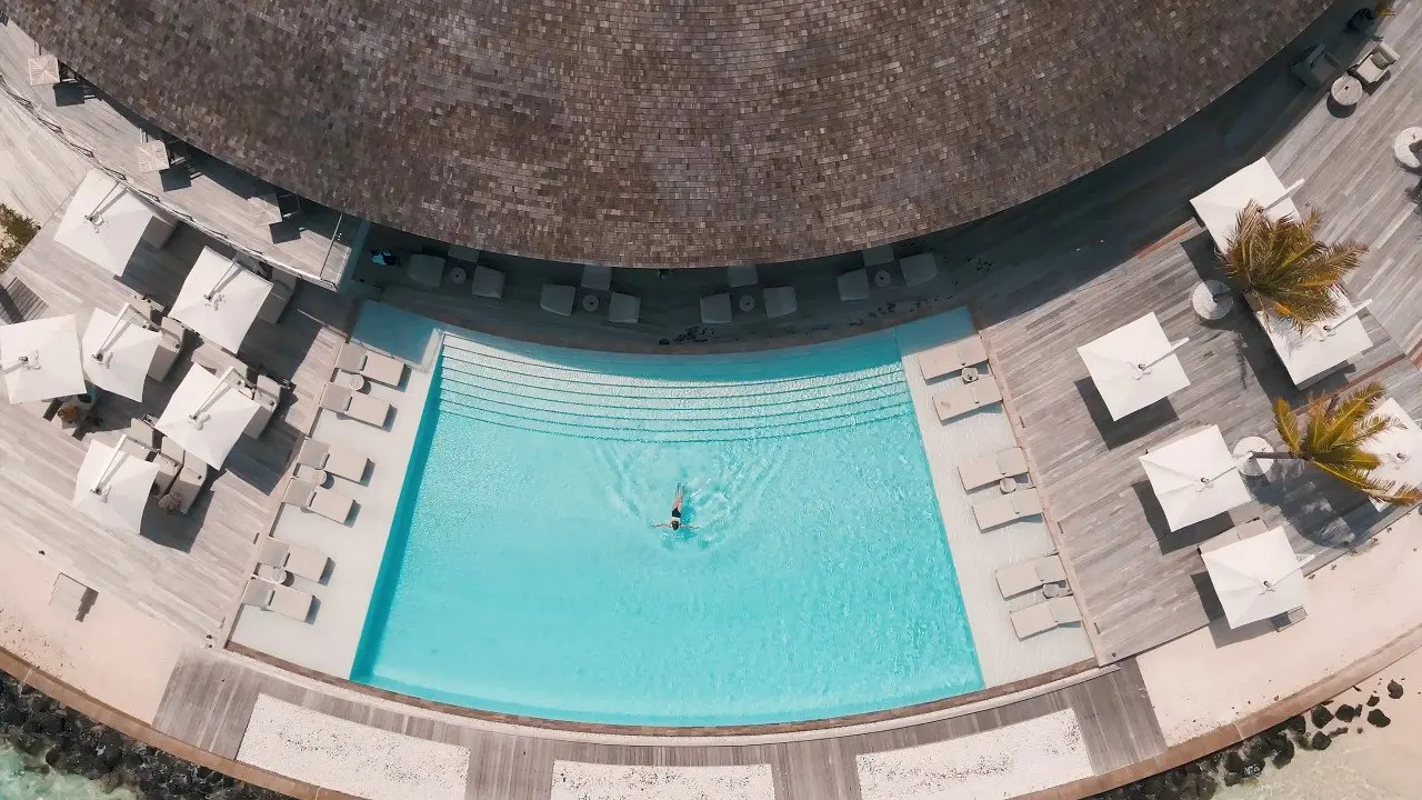 AerialKagiMaldives_PublicPoolAerialwithModelSwimming