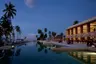 Hadahaa - Main pool & Dining Room at dusk (view from the Bar) (1359)