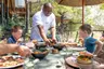 Singita Sabi Sand_Family outdoor lunch with Kids_Ross Couper