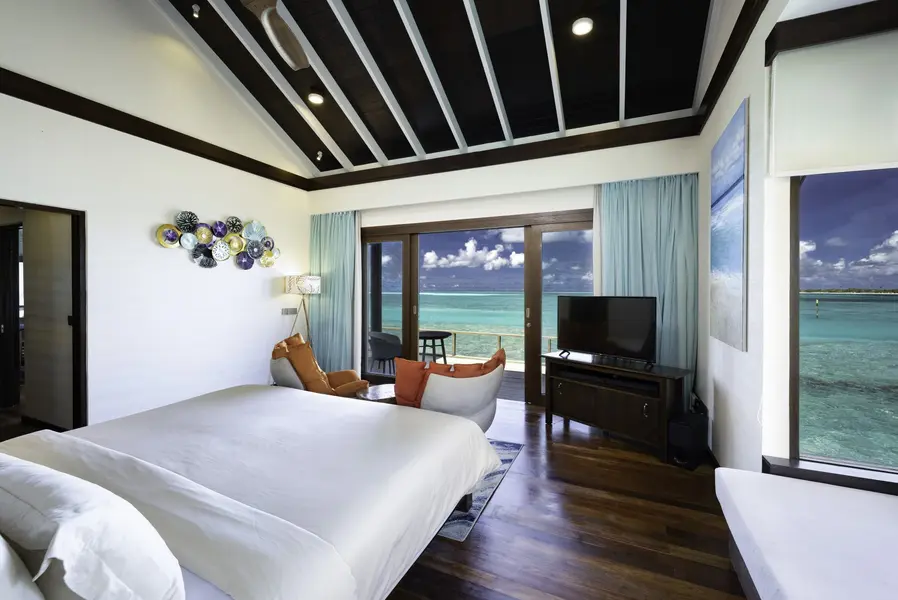 ATMOSPHERE KANIFUSHI - WATER VILLA - BEDROOM WITH VIEW