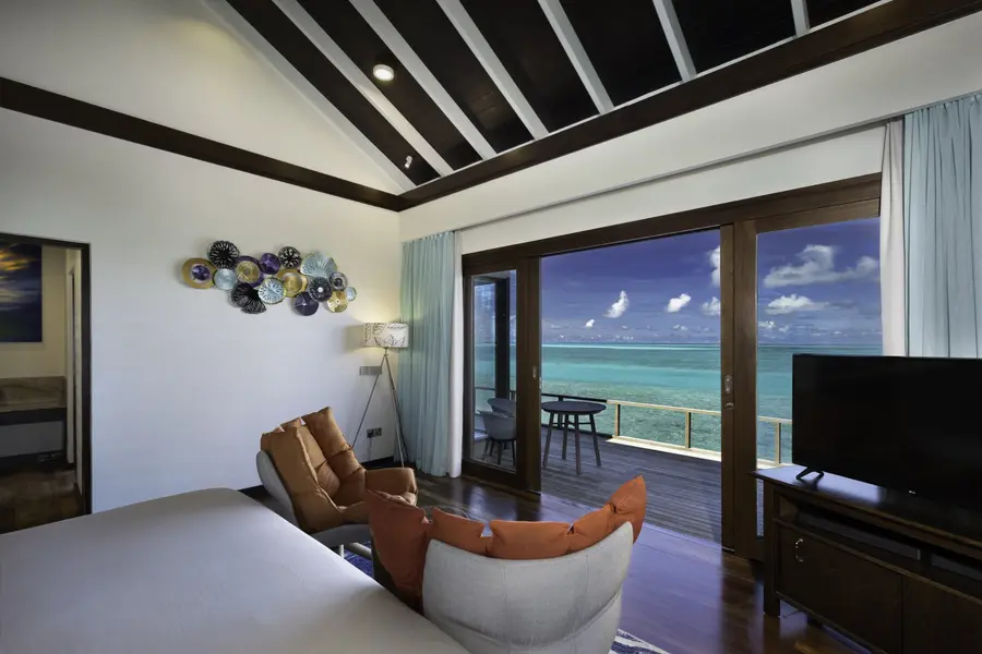 ATMOSPHERE KANIFUSHI - WATER VILLA - BEDROOM WITH VIEW 2