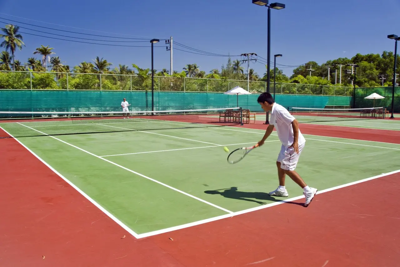 Anantara_Mai_Khao_Phuket_Villas_Recreation_facility_Guest_Playing_Tennis