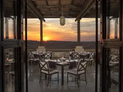 Qasr_Al_Sarab_Desert_Resort_by_Anantara_Restaurants_Suhail_Terrace_Sunset