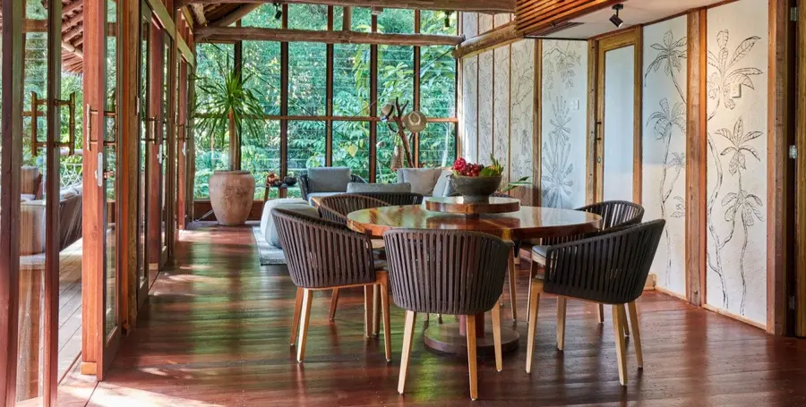 inside_living_and_dining_area_front_view_jungle_lodge_outdoor_deck_2