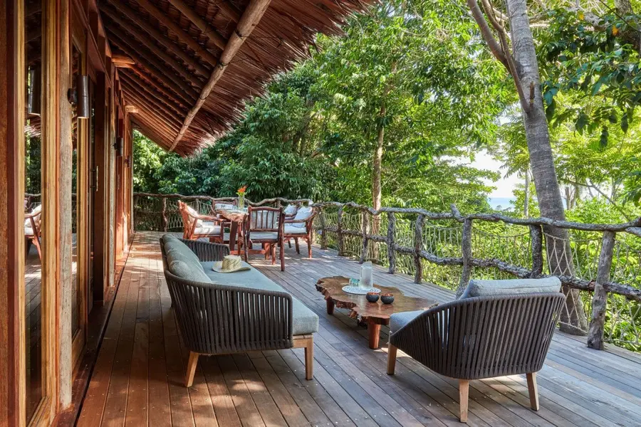 outside_dining_and_living_area_jungle_lodge_deck