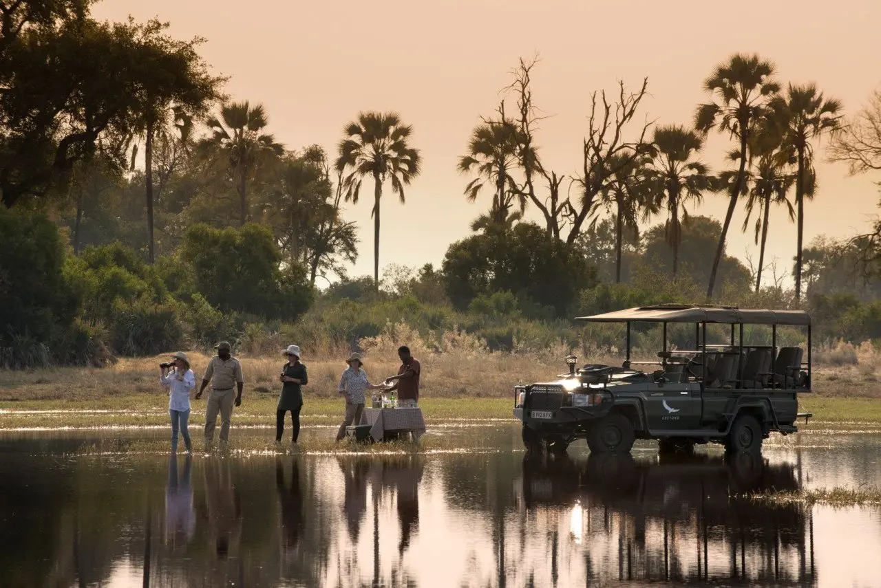 Botswana-Sandibe-Experience-Game-Drive-with-drink-stop-at-sunset