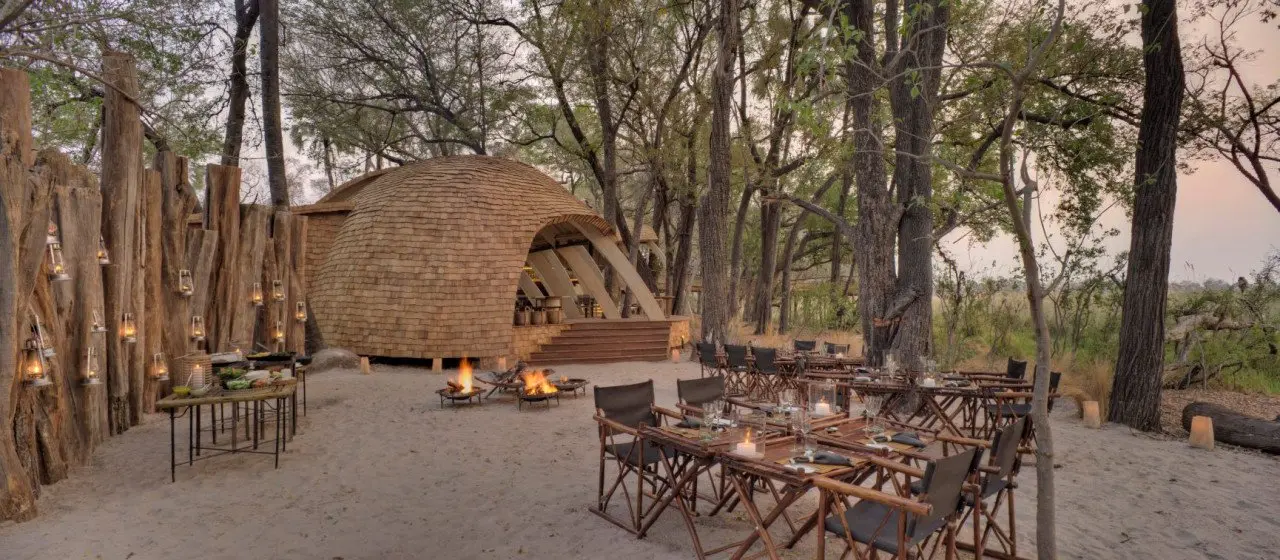 Botswana-Sandibe-Guest-Area-Boma-set-up-for-dinner