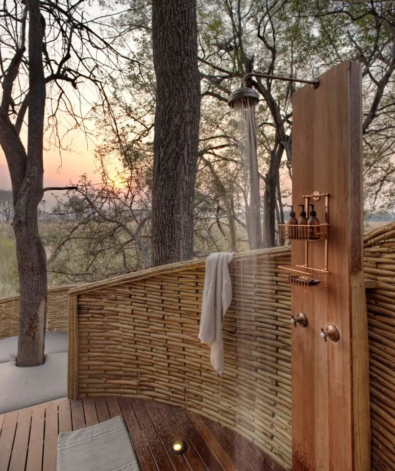 Botswana-Sandibe-Suite-outdoor-shower-at-sunset