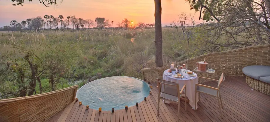 Botswana-Sandibe-Suite-deck-romantic-dinner-at-sunset