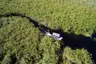 Botswana-Nxabega-Okavango-Tented-Camp-Aerial-view-of-boat-cruise