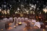 Botswana-Nxabega-Okavango-Tented-Camp-Guest-Area-Boma-with-staff