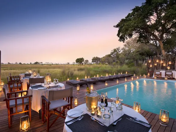 Botswana-Nxabega-Okavango-Tented-Camp-Guest-Area-Romantic-dinner-at-the-pool