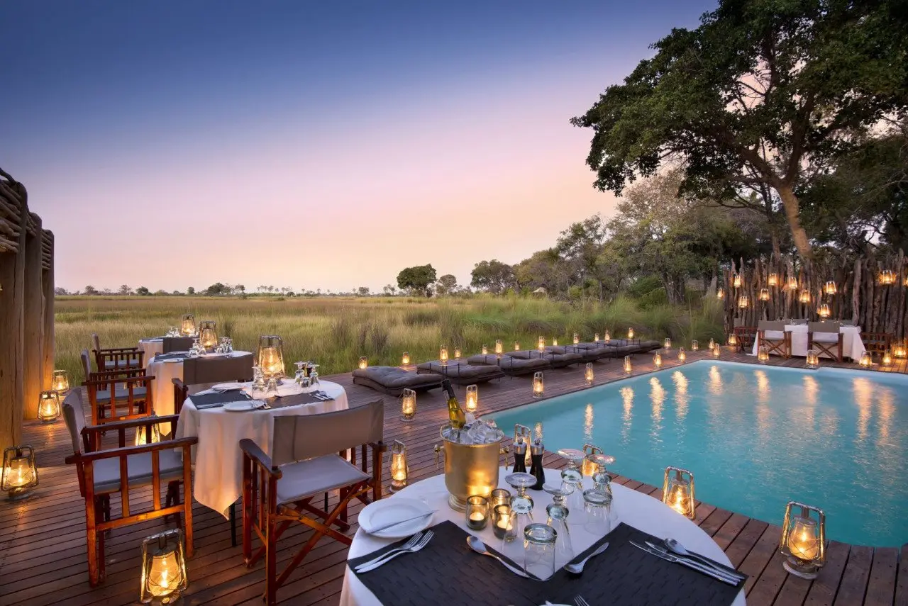 Botswana-Nxabega-Okavango-Tented-Camp-Guest-Area-Romantic-dinner-at-the-pool