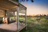 Botswana-Nxabega-Okavango-Tented-Camp-Tent-deck-and-swing-with-a-view