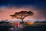 Tanzania-Serengeti-Under-Canvas-SUC-Guest-Area-camp-exterior-with-lantern-walkway-and-Maasai-2