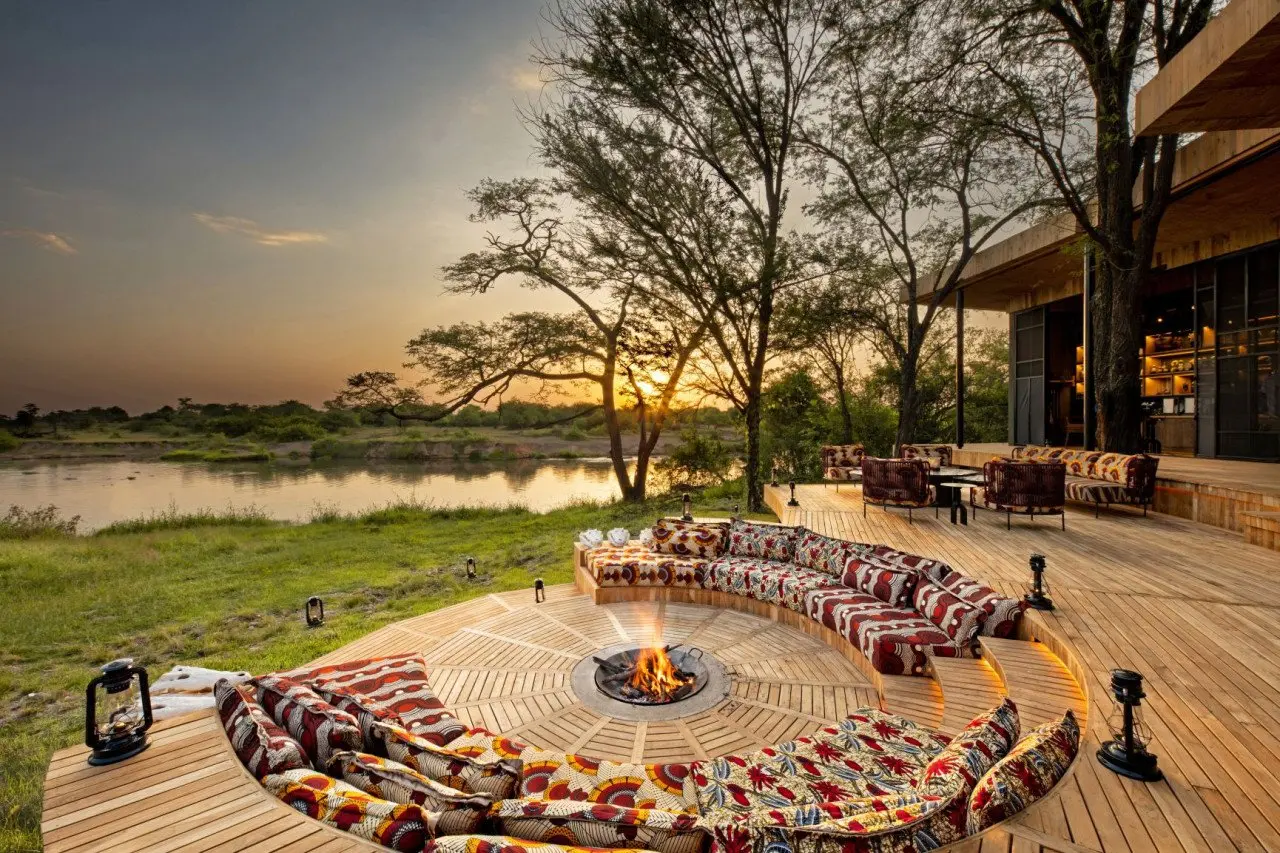 Tanzania-Grumeti-Serengeti-River-Lodge-Guest-Area-firepit-with-sunset