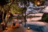 Tanzania-Grumeti-Serengeti-River-Lodge-Experiences-Guest-Delight-Pool-dinner_3