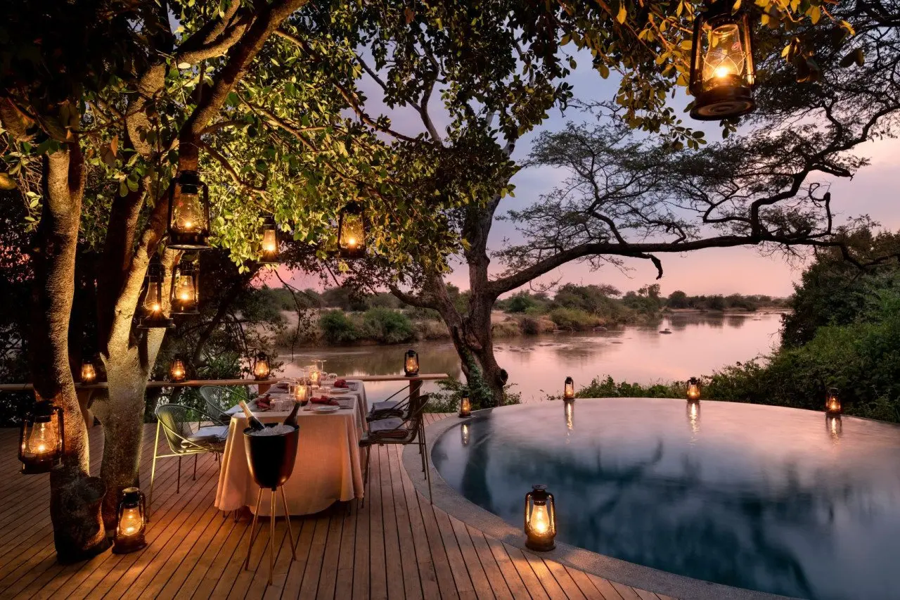 Tanzania-Grumeti-Serengeti-River-Lodge-Experiences-Guest-Delight-Pool-dinner_3