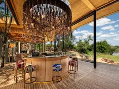 Tanzania-Grumeti-Serengeti-River-Lodge-Guest-Area-bar-with-river-view