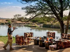 Tanzania-Grumeti-Serengeti-River-Lodge-Guest-Area-lounge-afternoon-tea-setup-Beyonder-butler