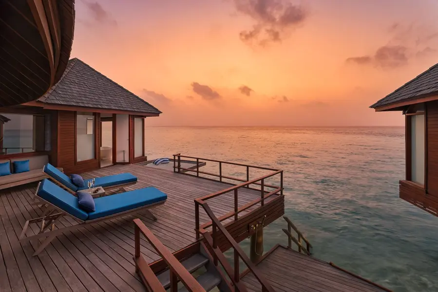 Anantara_Dhigu_Maldives_Resort_Guest_Room_Sunset_Over_Water_Villa_Deck