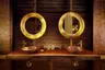 lit_round_copper_mirrors_with_basins_garden_suite