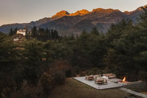 small_amankora-bhutan-paro-lodge-exterior-firepit-terrace