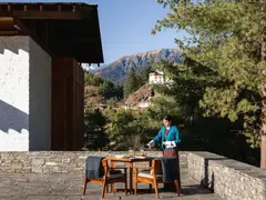small_amankora-bhutan-paro-lodge-exterior-courtyard-terrace-dining