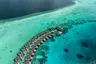 Avani_Plus_Fares_Maldives_Aerial_View_Over_Water_Villas_and_Lagoon