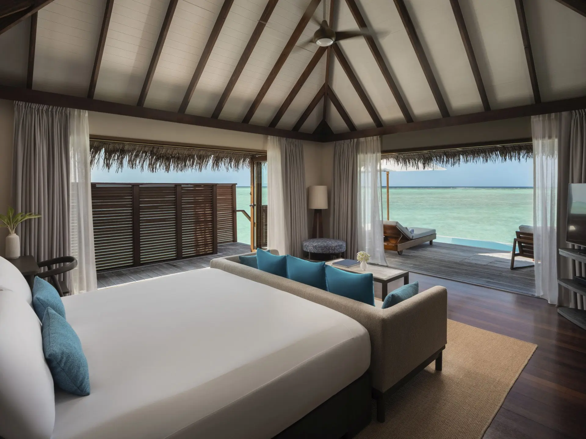 ConradMaldives_DeluxeWaterVillaWithPool_Bedroom_JA_1_HighRes