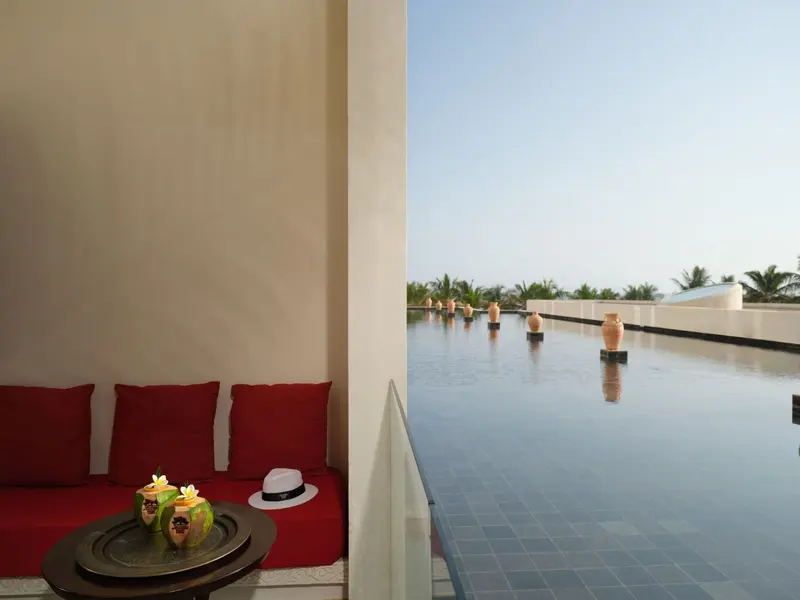 Al_Baleed_Resort_Salalah_By_Anantara_Guest_Room_Deluxe_Room_Balcony_with_Fountain_View