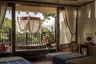 Anantara_Golden_Triangle_Elephant_Camp_And_Resort_Spa_Anantara_Spa_Double_Treatment_Room_With_Therapist_Outside_Next_To_Bath_On_The_Balcony