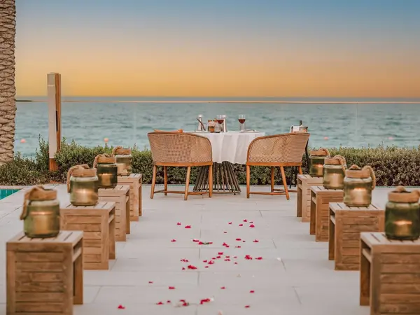 Naama Beach Villas & Spa - poolside romantic dining