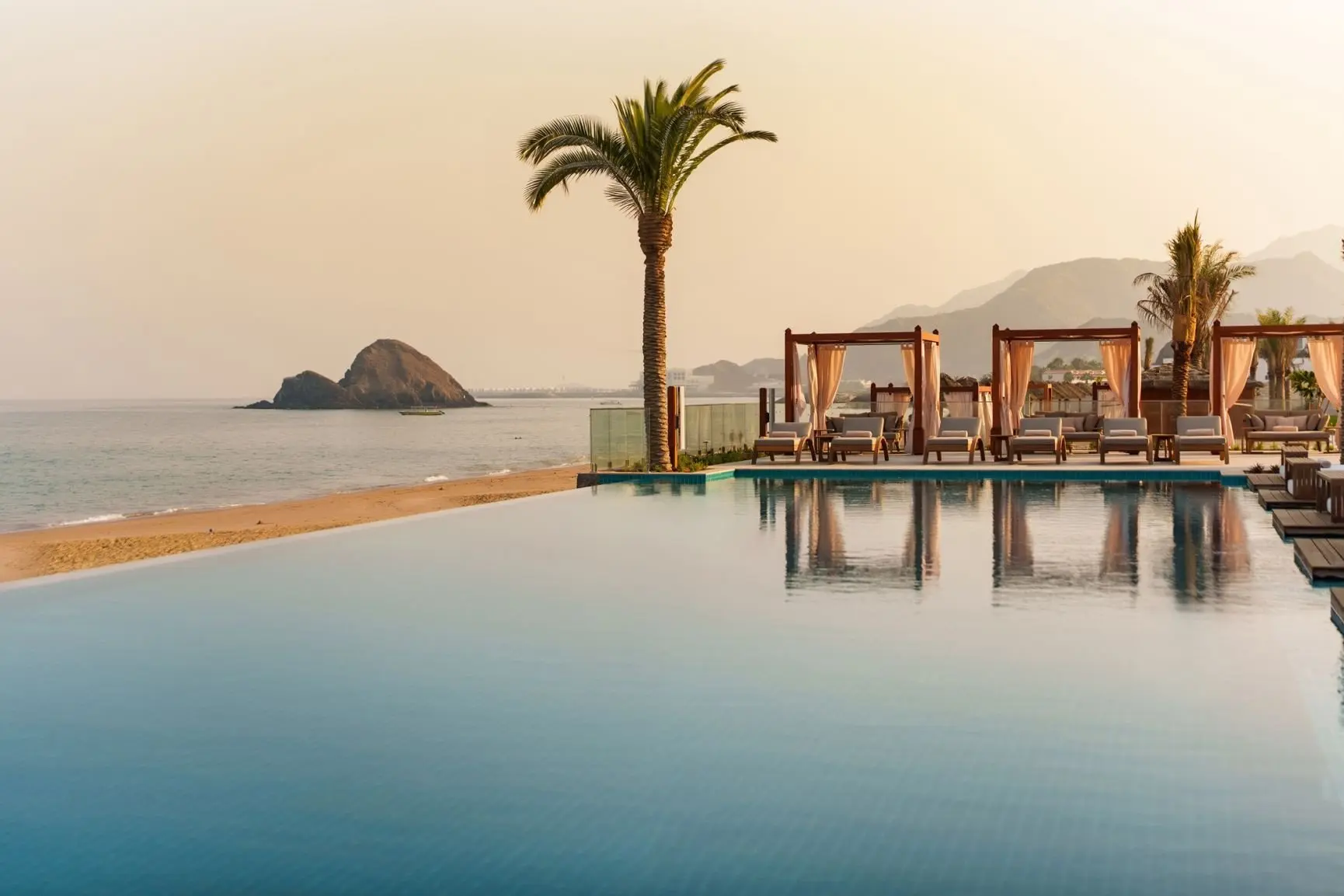 Naama Beach Villas & Spa - poolside sunset