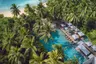 Palm fringed main pool at Vakkaru Maldives