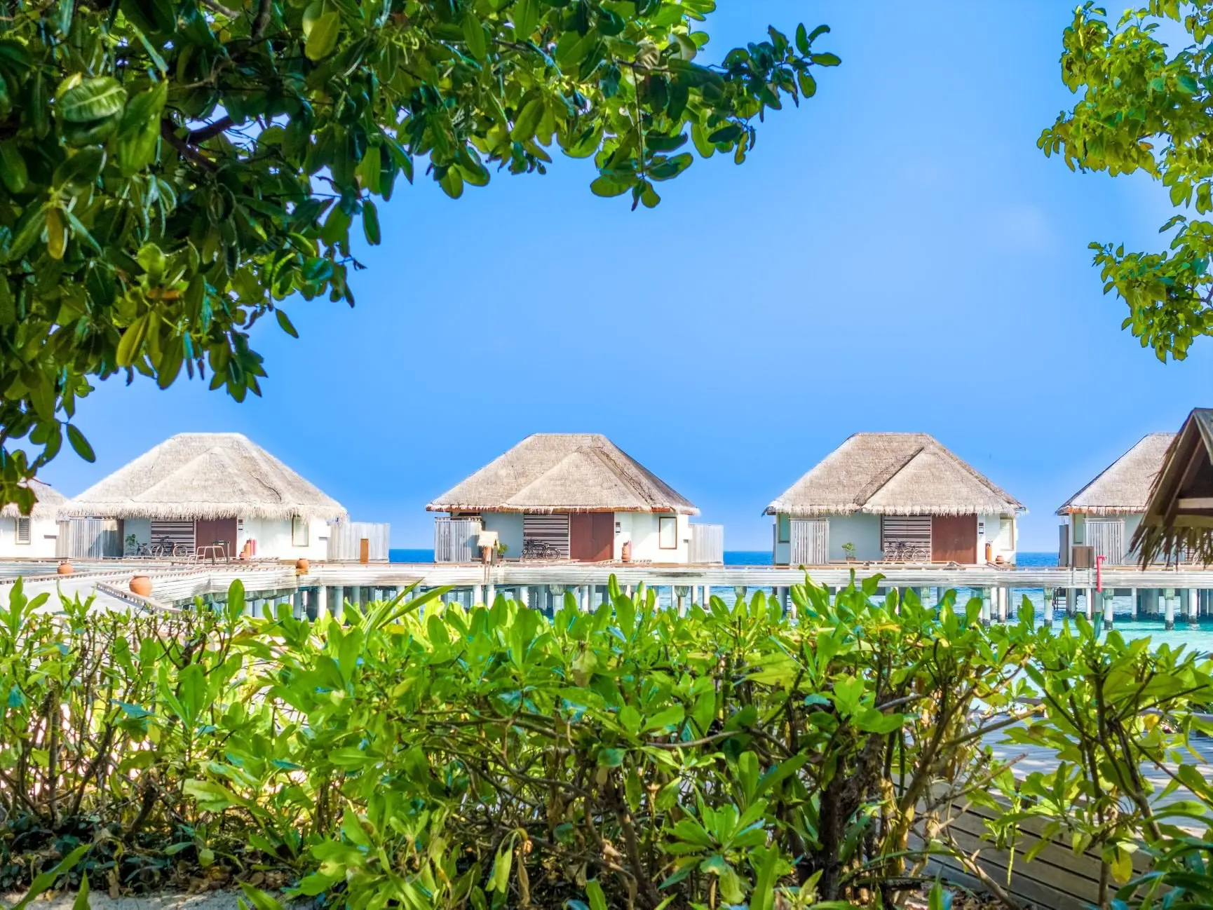 dusit-thani-maldives-accommodation-overwater-villas-exterior-view