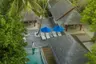 dusit-thani-maldives-accommodation-pool-villa-with-woman