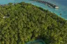 dusit-thani-maldives-exterior-tennis-course-top-view
