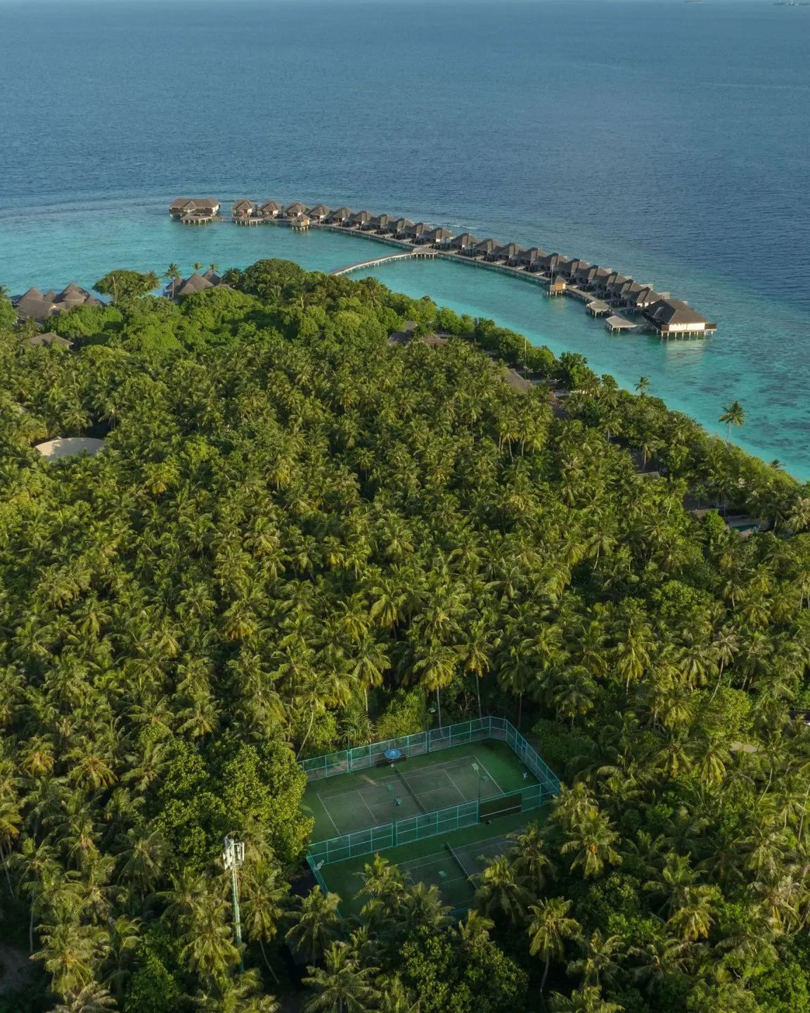 dusit-thani-maldives-exterior-tennis-course-top-view
