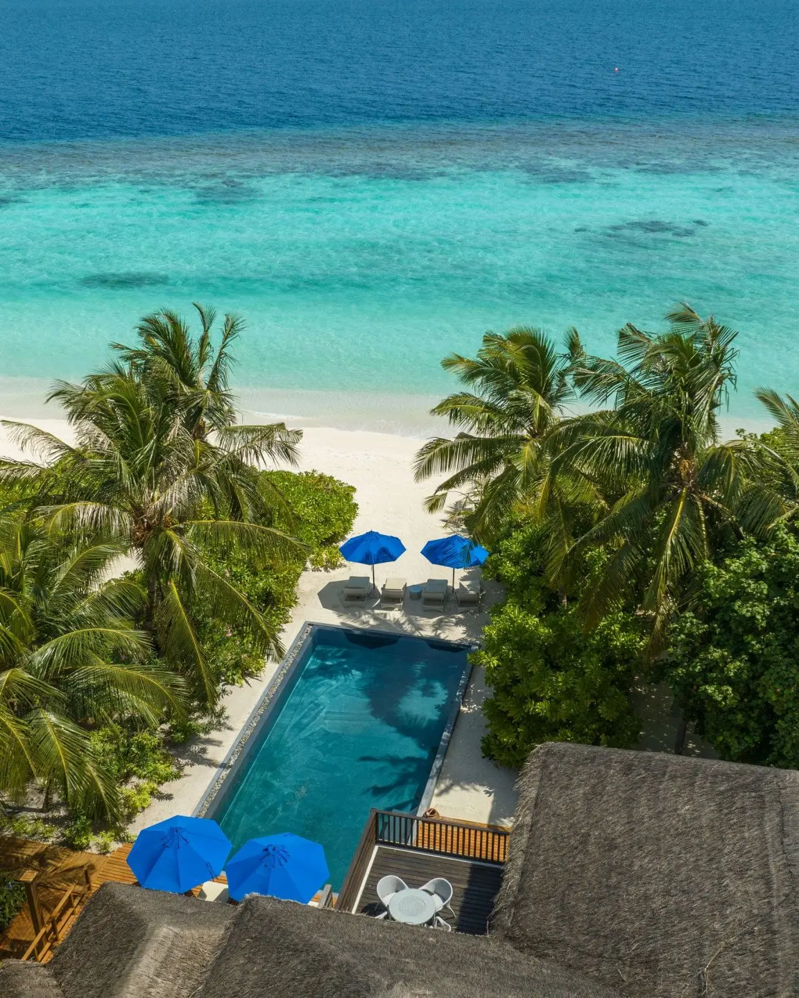 dusit-thani-maldives-exterior-pool-villa-drone