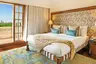 Deluxe_Suite_with_Balcony_-_bedroom_