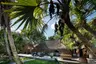 Benguerra-Island-Casa-Familia-exterior-view-breakfast-setup