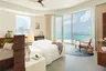 High_resolution_300dpi-Jumeirah Maldives - Sunset Water Villa - Bedroom
