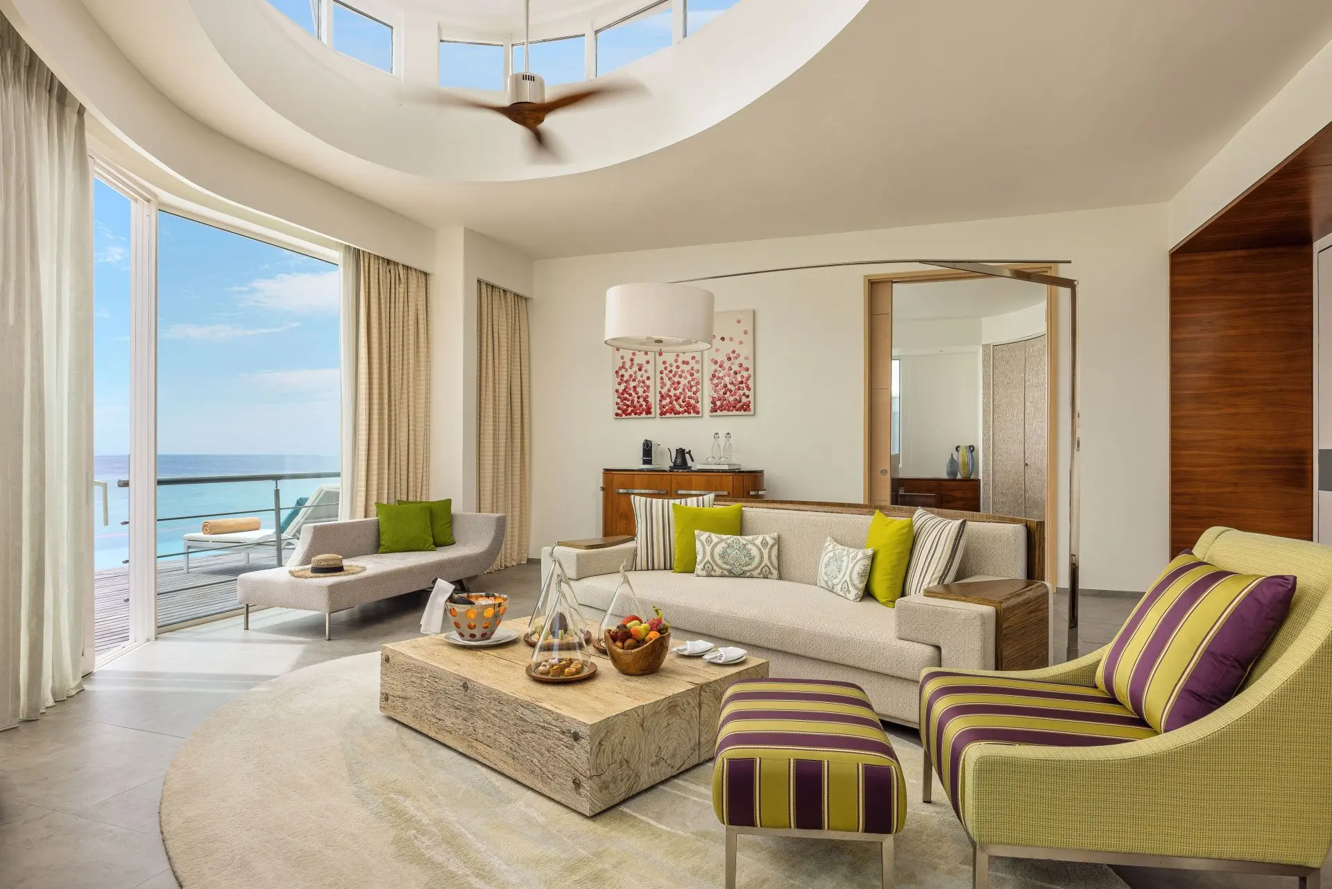 High_resolution_300dpi-Jumeirah Maldives - Lagoon Water Villa with Pool - Living Room