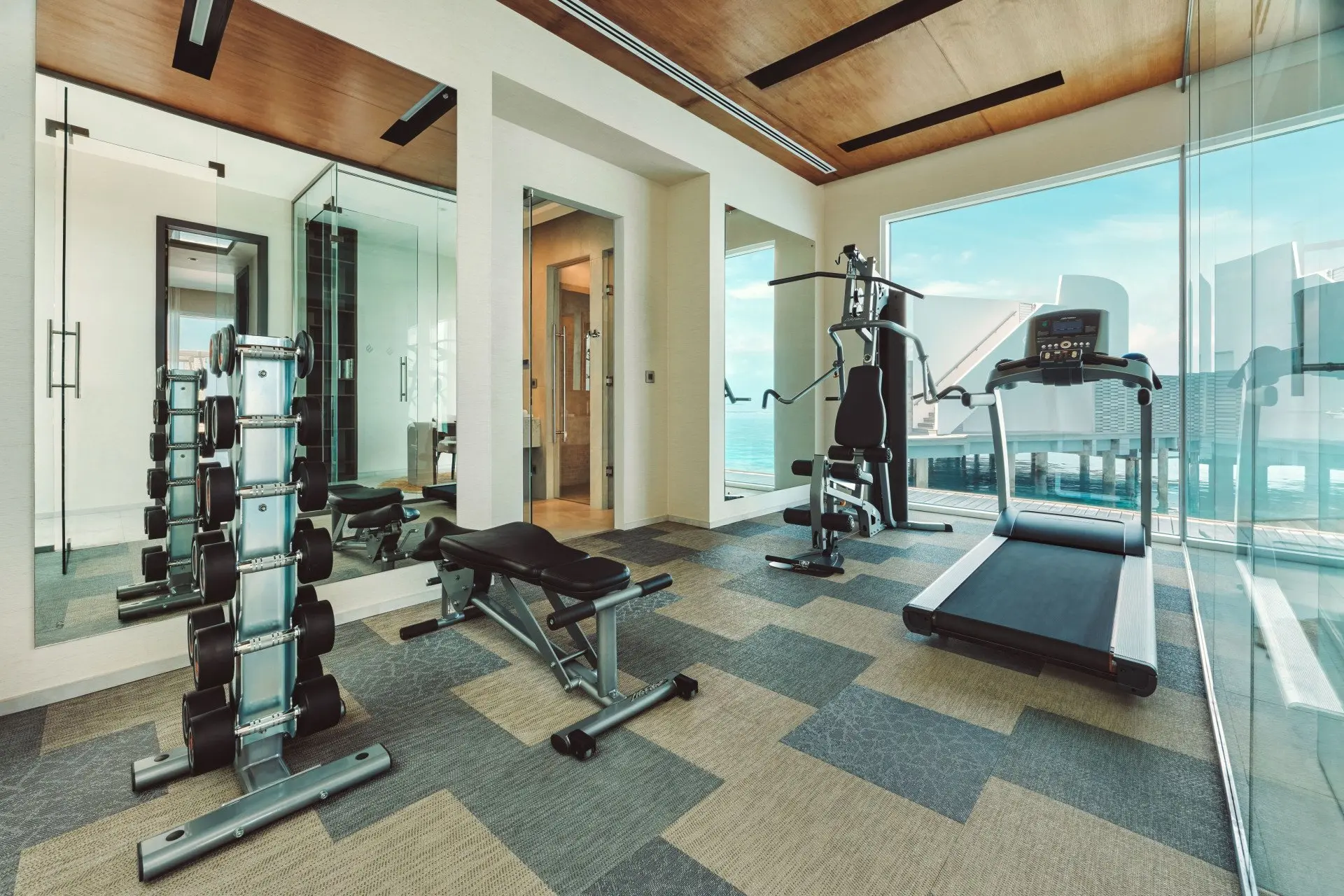 High_resolution_300dpi-Jumeirah Maldives - Indoor Gym- Three Bedroom Olhahali Water Retreat with Pool